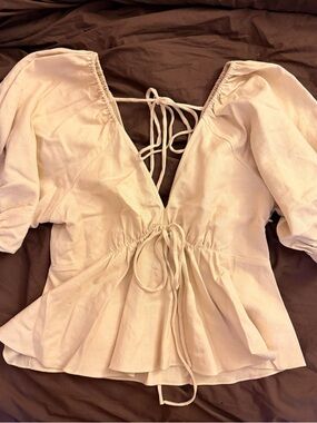 Lucy Paris Cream Puff Sleeve Tie-Back Peplum Top